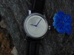 Hand guilloche watch dial.