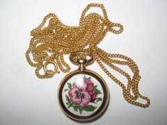 Wisiorek-zegarek firmy Royal