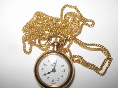 Wisiorek-zegarek firmy Royal