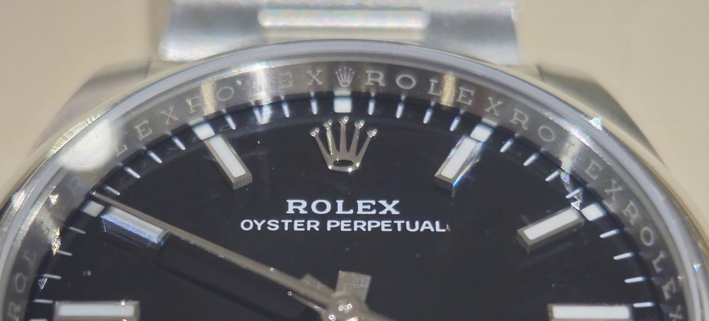 rolex.thumb.jpg.35929bb7569e6b7fa525bd8b339bbc8a.jpg