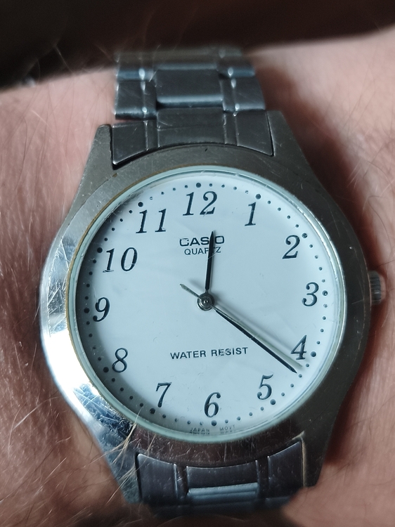 64 CASIO  MTP1128A-7BH.jpg
